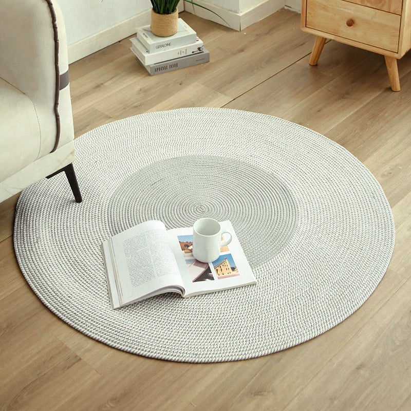 Cotton and linen woven fringed floor mat, round